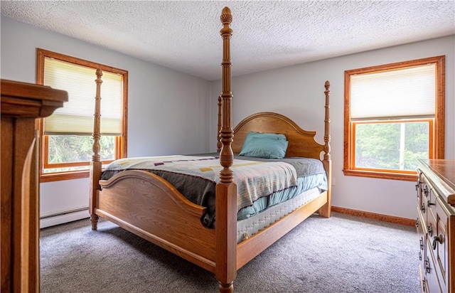 1846 E Wallum Lake Rd, Burrillville, RI 02859 - bedroom featuring baseboard heating, carpet flooring, multiple windows, and a textured ceiling