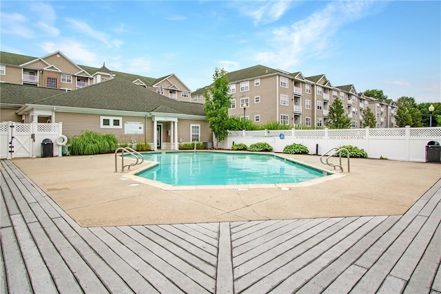 120 Mill St Unit 103, Woonsocket, RI 02895 - community pool with a fenced backyard and a patio area