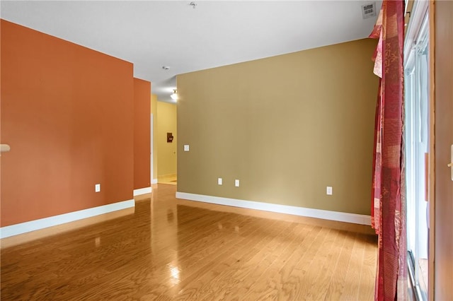 120 Mill St Unit 103, Woonsocket, RI 02895 - empty room with light wood-style flooring
