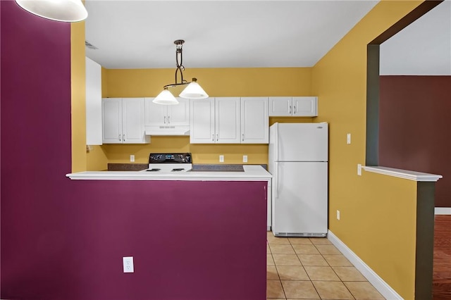 120 Mill St Unit 103, Woonsocket, RI 02895 - kitchen featuring freestanding refrigerator, under cabinet range hood, range with electric cooktop, white cabinets, and pendant lighting