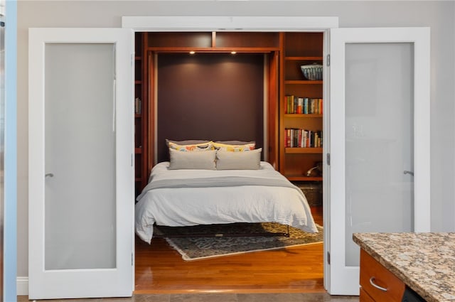333 Atwells Ave Unit 302, Providence, RI 02903 - bedroom featuring a closet and wood finished floors