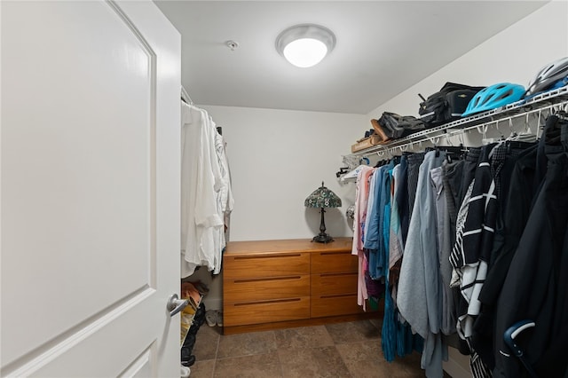 333 Atwells Ave Unit 302, Providence, RI 02903 - walk in closet featuring dark stone finish floors