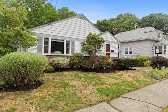 112 Edgewood Blvd, Providence, RI 02905 - bungalow-style home with a front lawn