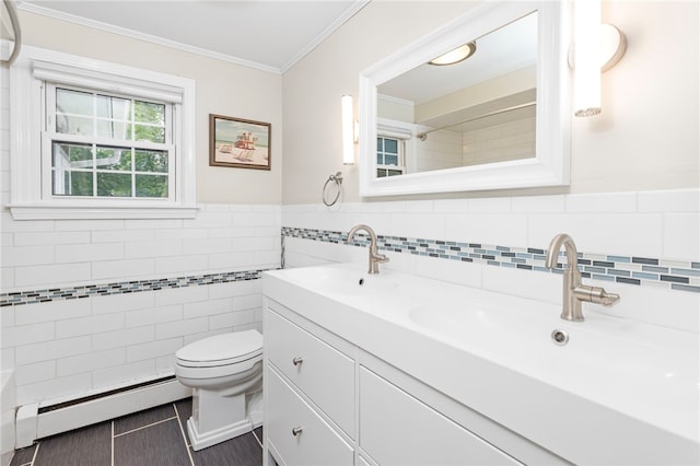 112 Edgewood Blvd, Providence, RI 02905 - bathroom featuring a baseboard radiator, double vanity, ornamental molding, tile walls, and a wainscoted wall