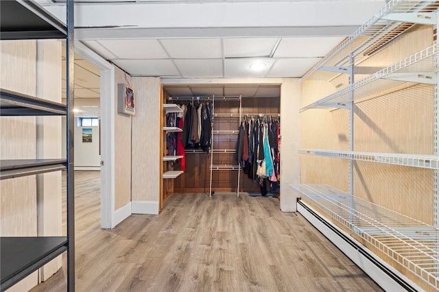 112 Edgewood Blvd, Providence, RI 02905 - spacious closet featuring a baseboard radiator and wood finished floors