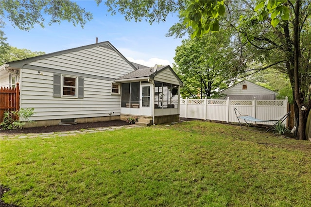 112 Edgewood Blvd, Providence, RI 02905 - back of property with a sunroom and a fenced backyard