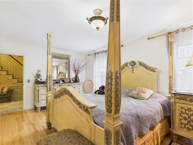150 Central Ave, Johnston, RI 02919 - bedroom with ornamental molding and wood-type flooring