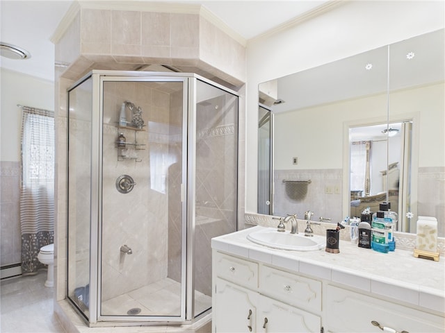 150 Central Ave, Johnston, RI 02919 - bathroom featuring tile walls, a shower stall, vanity, a wainscoted wall, and tile patterned flooring