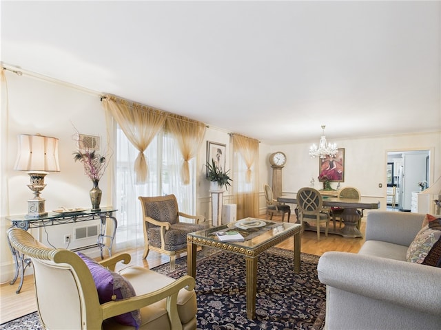 150 Central Ave, Johnston, RI 02919 - living area with a chandelier and light wood-type flooring