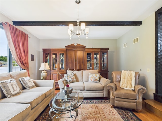 150 Central Ave, Johnston, RI 02919 - living room featuring a chandelier, beamed ceiling, and wood finished floors
