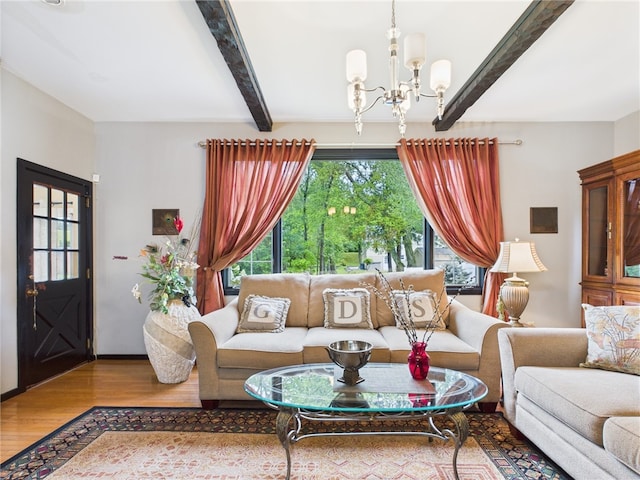 150 Central Ave, Johnston, RI 02919 - living area with beam ceiling, wood finished floors, and a chandelier