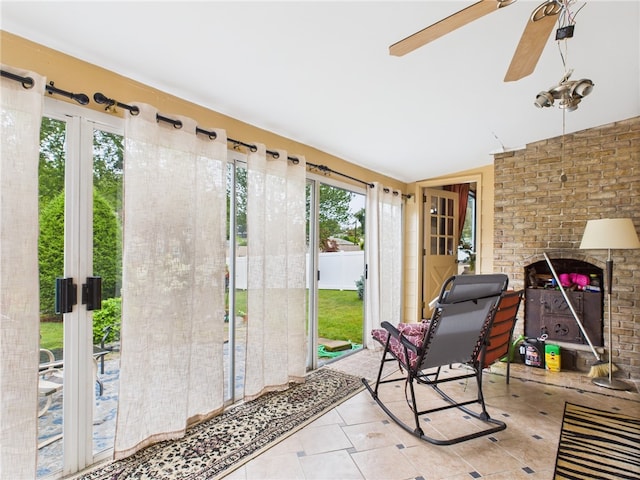 150 Central Ave, Johnston, RI 02919 - sunroom featuring vaulted ceiling, a brick fireplace, french doors, and a ceiling fan