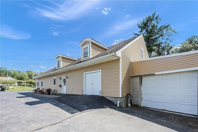 240 Smith St, Attleboro, MA 02703 - view of property exterior with driveway and a shingled roof