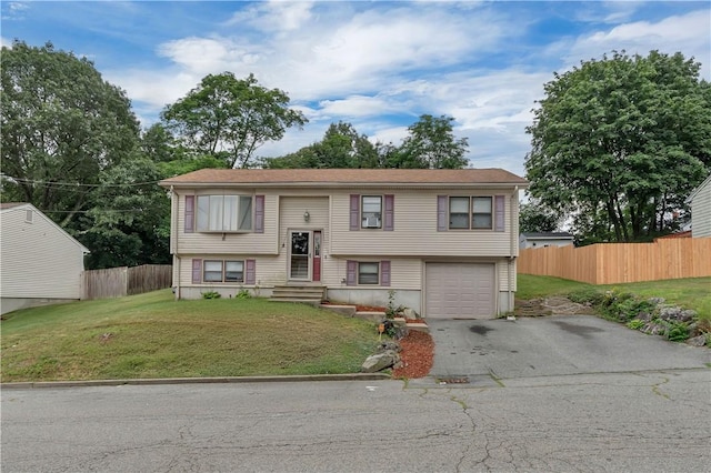 8 Gale Ct, North Providence, RI 02904 - bi-level home with a garage, asphalt driveway, and entry steps