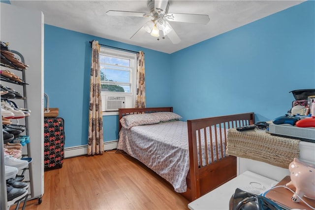 8 Gale Ct, North Providence, RI 02904 - bedroom featuring wood finished floors, a baseboard radiator, and ceiling fan