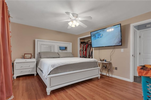 8 Gale Ct, North Providence, RI 02904 - bedroom featuring wood finished floors, a walk in closet, and a ceiling fan