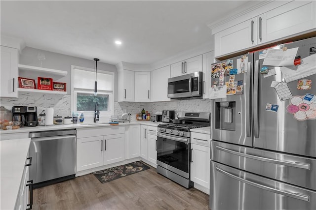 8 Gale Ct, North Providence, RI 02904 - kitchen featuring stainless steel appliances, backsplash, light countertops, white cabinets, and recessed lighting