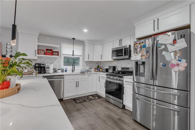 8 Gale Ct, North Providence, RI 02904 - kitchen featuring stainless steel appliances, decorative backsplash, white cabinets, and recessed lighting