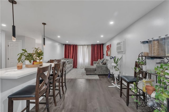 8 Gale Ct, North Providence, RI 02904 - dining space with wood finished floors, a wall mounted AC, and recessed lighting