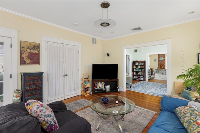 179 Cole Ave Unit 2, Providence, RI 02906 - living area featuring wood finished floors and ornamental molding