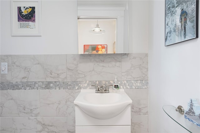 179 Cole Ave Unit 2, Providence, RI 02906 - bathroom featuring vanity and tasteful backsplash