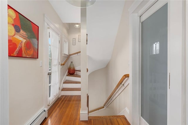 179 Cole Ave Unit 2, Providence, RI 02906 - foyer featuring wood finished floors and a baseboard heating unit