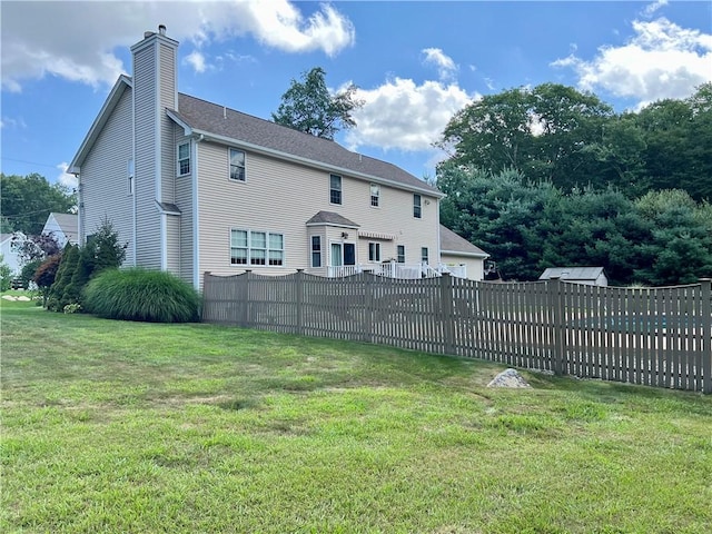 35 E Lantern Rd, Smithfield, RI 02917 - back of property with a chimney