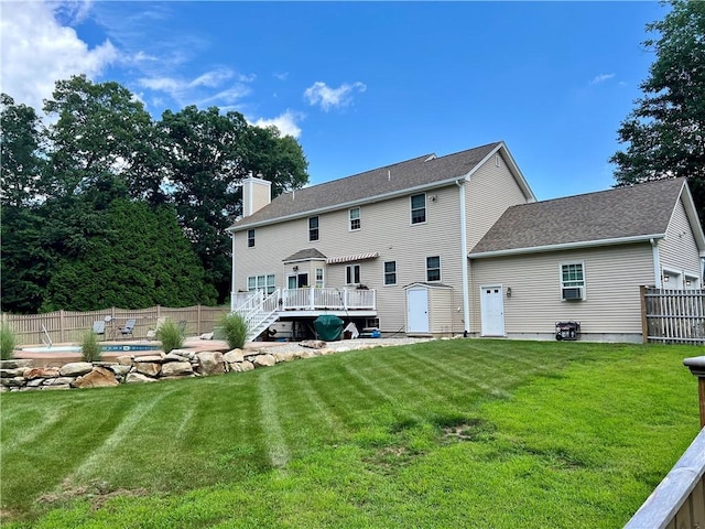 35 E Lantern Rd, Smithfield, RI 02917 - back of property with a wooden deck, a fenced backyard, a chimney, stairs, and a shingled roof