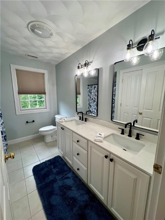 35 E Lantern Rd, Smithfield, RI 02917 - bathroom with double vanity, tile patterned floors, and curtained shower