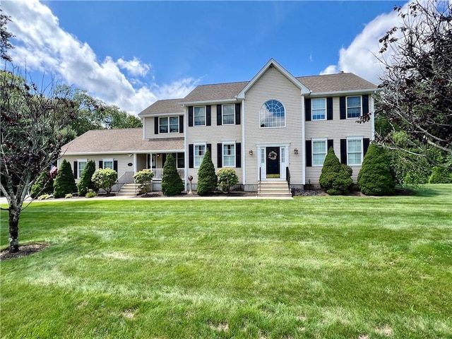 35 E Lantern Rd, Smithfield, RI 02917 - colonial inspired home featuring a front lawn, covered porch, and roof with shingles