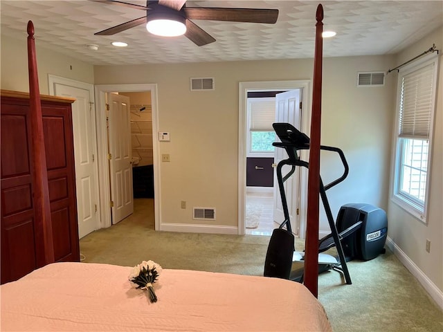 35 E Lantern Rd, Smithfield, RI 02917 - bedroom with light colored carpet, a walk in closet, ensuite bath, ceiling fan, and recessed lighting