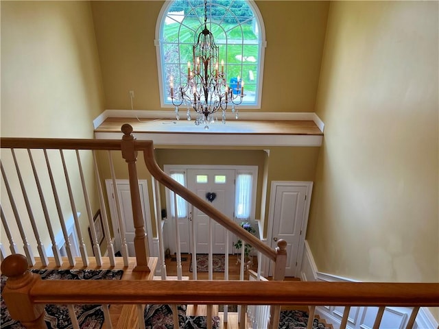 35 E Lantern Rd, Smithfield, RI 02917 - staircase featuring a chandelier