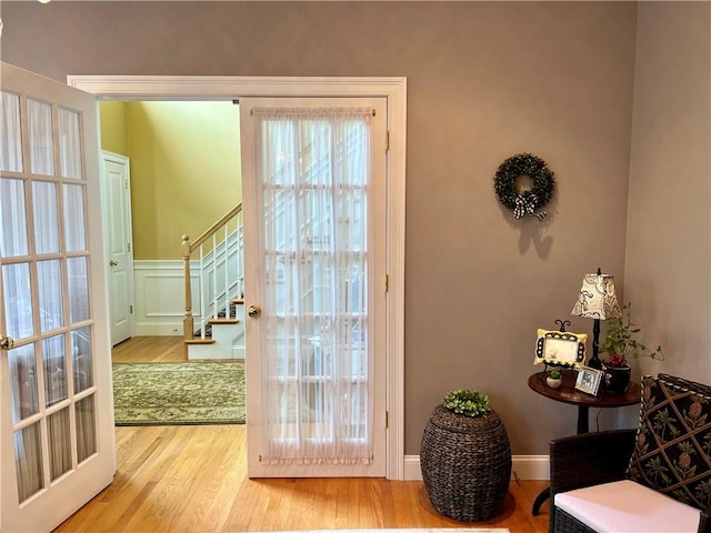 35 E Lantern Rd, Smithfield, RI 02917 - entryway with stairs, wood finished floors, and a wainscoted wall
