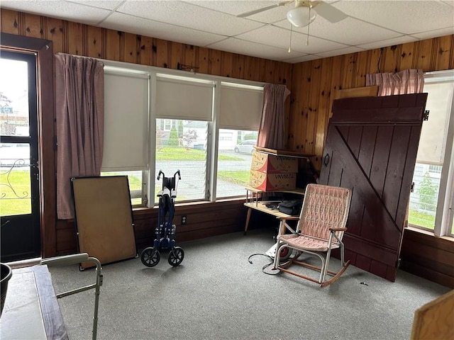 12 Oakland Ave, Johnston, RI 02919 - home office with wood walls, carpet, a ceiling fan, and a drop ceiling