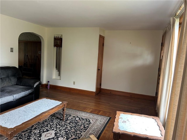 12 Oakland Ave, Johnston, RI 02919 - living room with arched walkways and wood finished floors