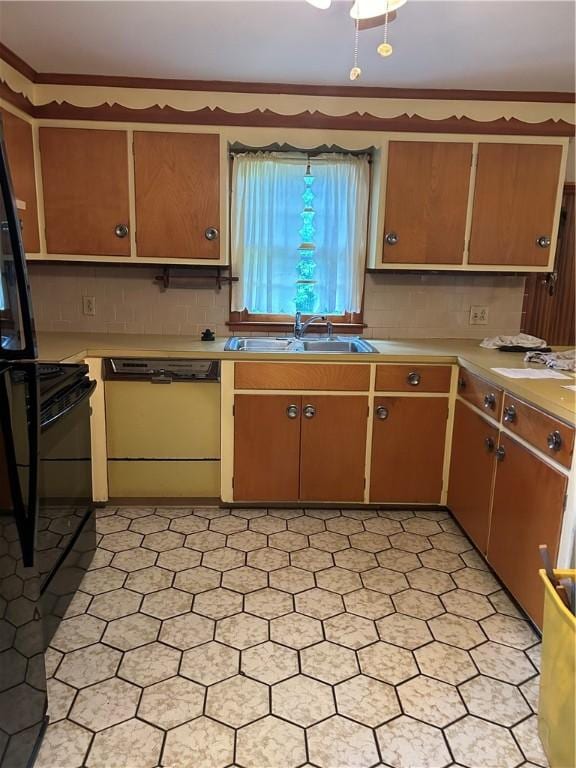 12 Oakland Ave, Johnston, RI 02919 - kitchen with dishwashing machine, light countertops, decorative backsplash, and black range with electric cooktop