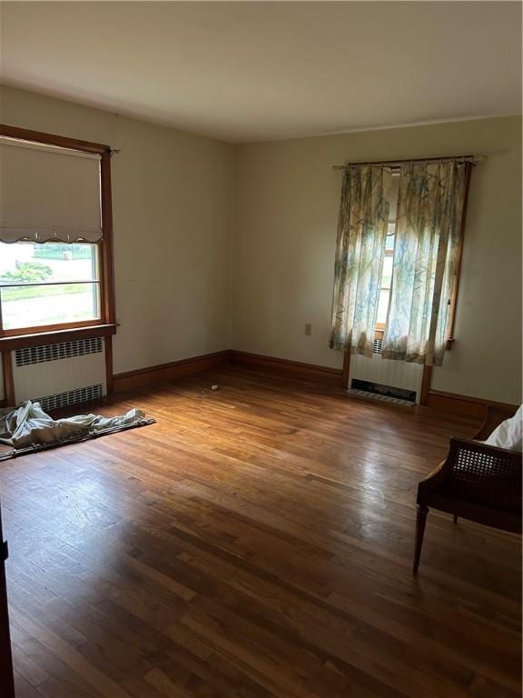 12 Oakland Ave, Johnston, RI 02919 - spare room featuring radiator and wood finished floors