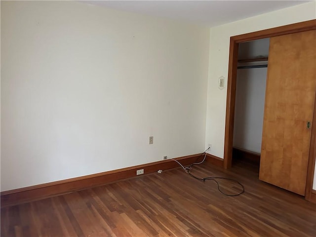 12 Oakland Ave, Johnston, RI 02919 - unfurnished bedroom with wood finished floors and a closet
