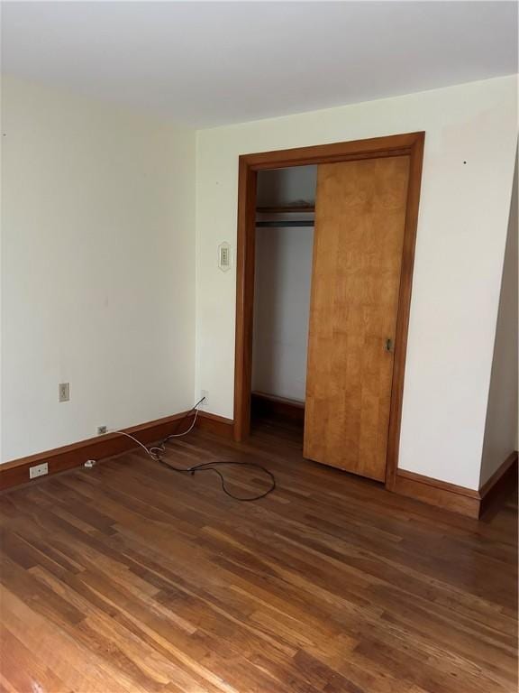 12 Oakland Ave, Johnston, RI 02919 - unfurnished bedroom featuring wood finished floors and a closet