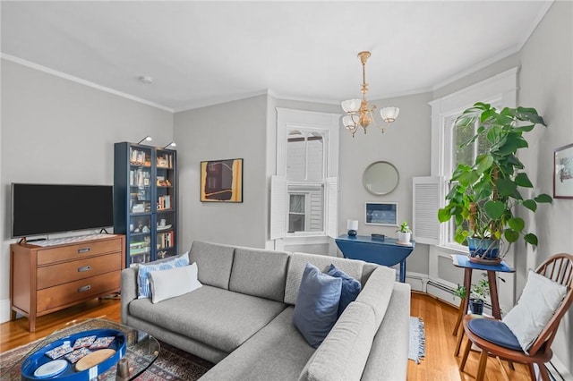 303 Angell St Unit 3, Providence, RI 02906 - living room featuring light wood-style flooring, a chandelier, and crown molding