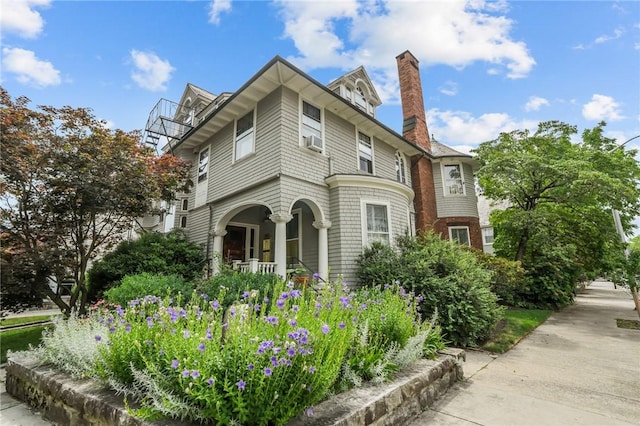 303 Angell St Unit 3, Providence, RI 02906 - view of front of property featuring a chimney and a porch