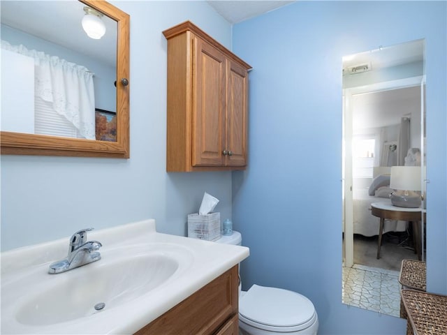 184 Vallette St, Cranston, RI 02920 - bathroom with toilet and vanity