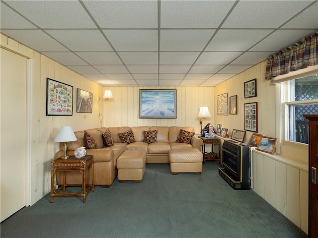 184 Vallette St, Cranston, RI 02920 - carpeted living room featuring a drop ceiling and wooden walls