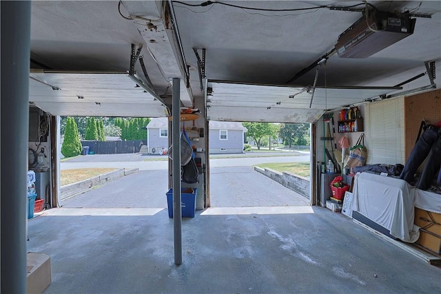 184 Vallette St, Cranston, RI 02920 - garage featuring a garage door opener