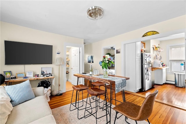 13 Dean Ave, Newport, RI 02840 - dining area with light wood finished floors and baseboard heating
