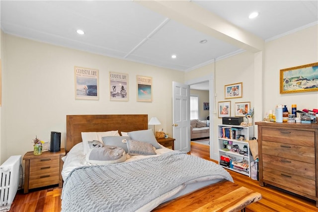 13 Dean Ave, Newport, RI 02840 - bedroom featuring radiator heating unit, wood finished floors, crown molding, and recessed lighting
