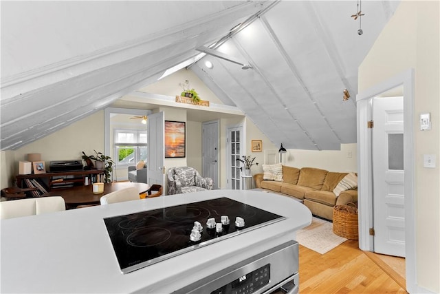 13 Dean Ave, Newport, RI 02840 - kitchen with lofted ceiling, open floor plan, light wood-type flooring, and black electric cooktop