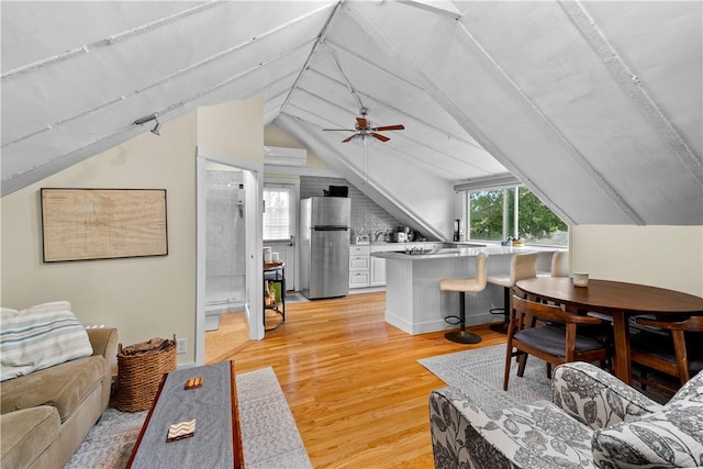 13 Dean Ave, Newport, RI 02840 - living area with light wood-type flooring, vaulted ceiling, and a ceiling fan