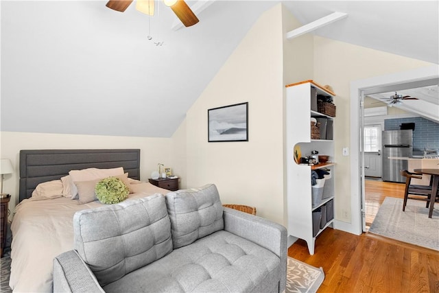 13 Dean Ave, Newport, RI 02840 - bedroom with freestanding refrigerator, lofted ceiling, wood finished floors, and a ceiling fan