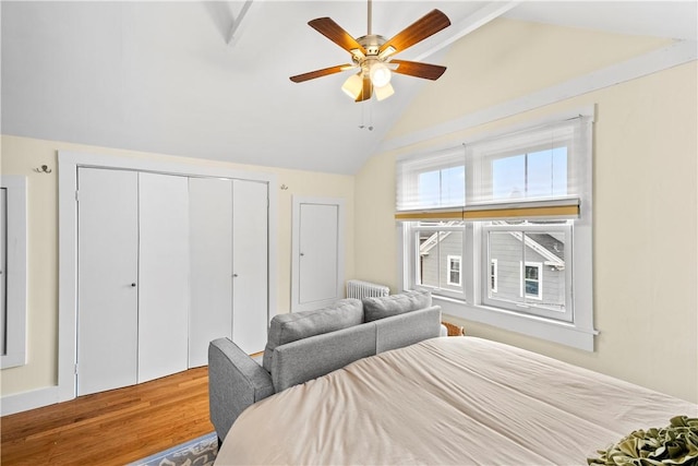 13 Dean Ave, Newport, RI 02840 - bedroom featuring vaulted ceiling, wood finished floors, a ceiling fan, and radiator heating unit